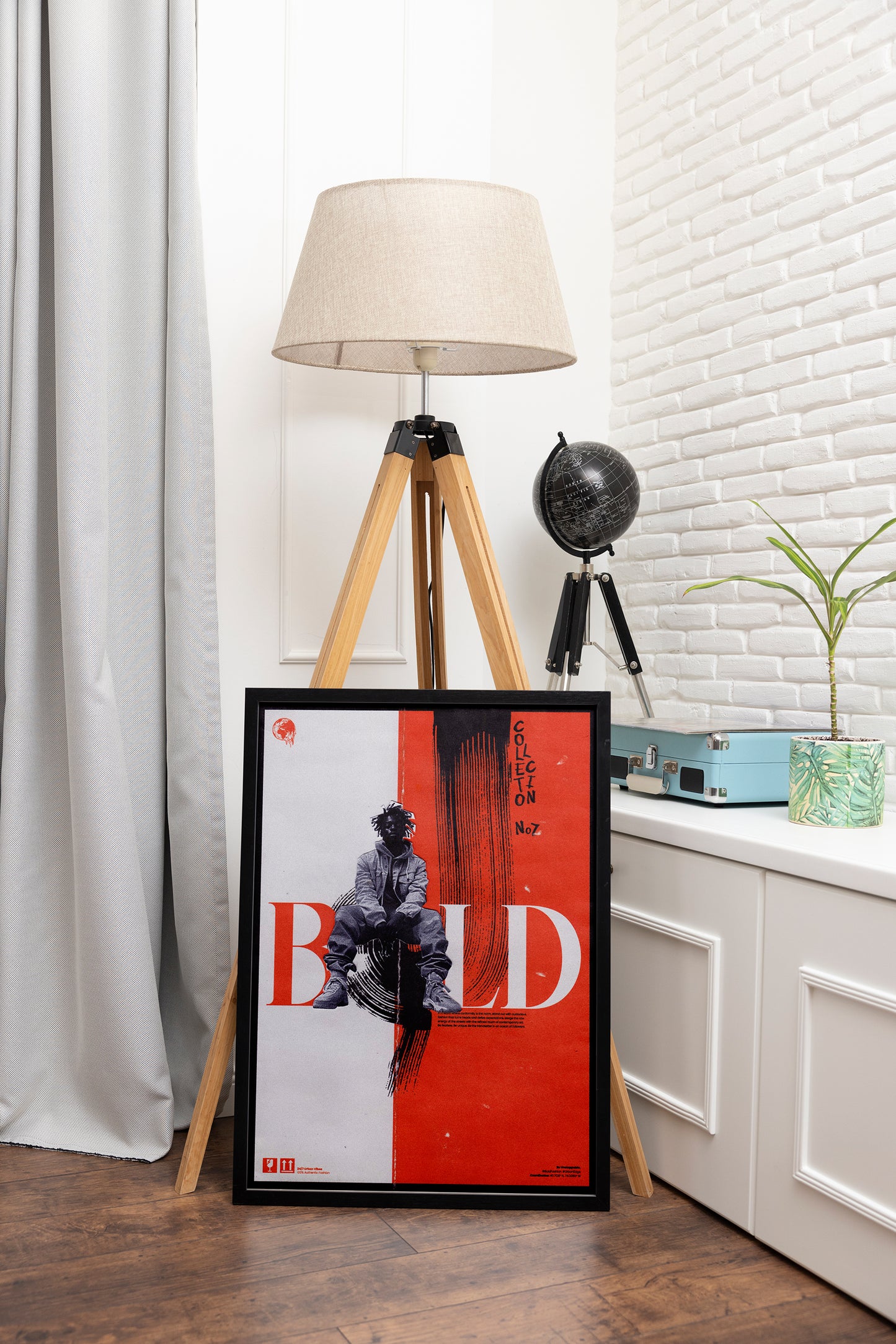 BOLD poster in orange, framed in black, showcasing a punk figure with a striking hairstyle, raw grunge textures, and a bold orange background, styled in an adventure-themed room with a globe.