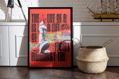 Life of a Designer framed poster with orange tones and vibrant clipped adverts, styled with a basket casting shadows and a vintage sailor boat on a shelf in the background.